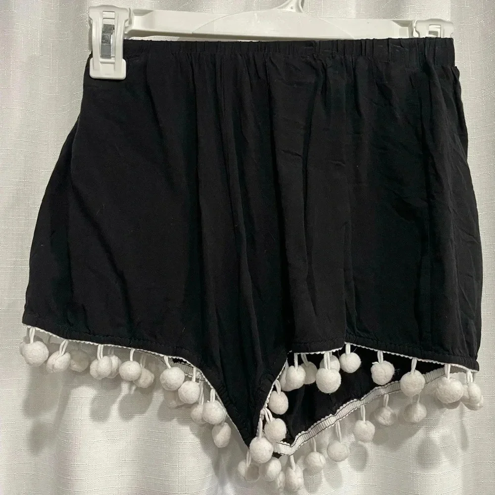 Black shorts with white trim